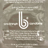A square packet of bCondoms Extra Strength Lubricated Condoms with a comfort fit design, featuring the bCondoms white logo and text. The packet includes a caution that the product contains natural rubber latex which may cause allergic reactions and notes about reducing, but not eliminating, risks during sexual activity.
